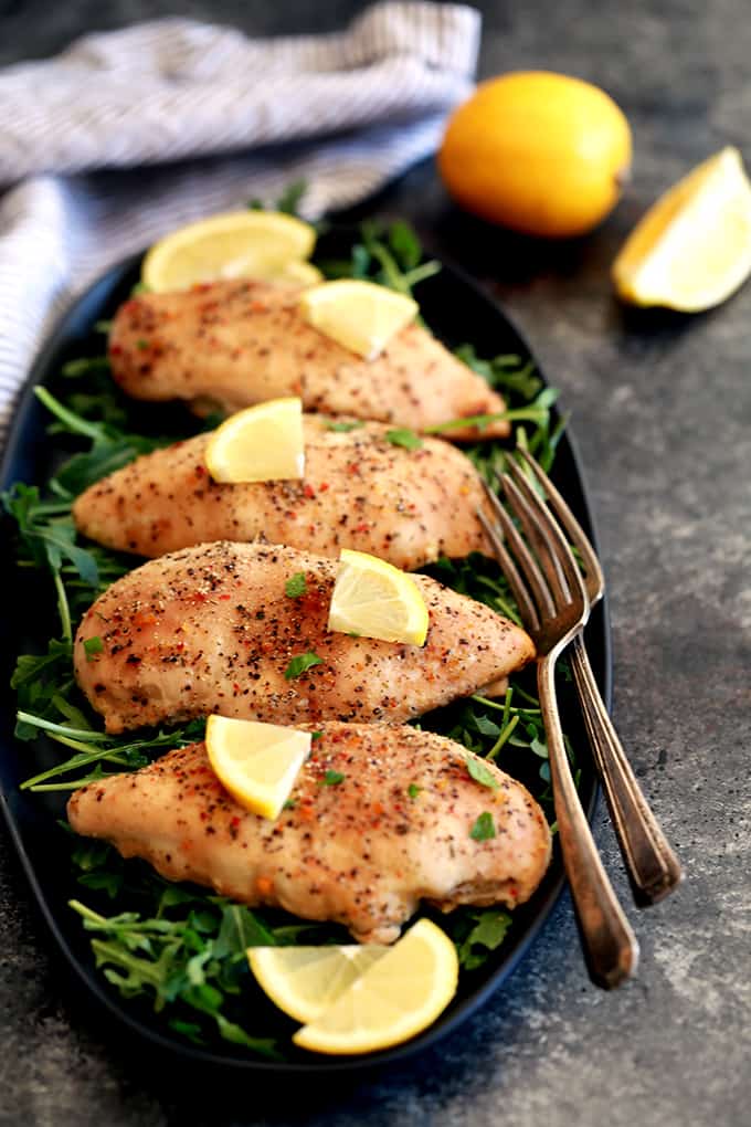 This flavorful, four ingredient Slow Cooker Lemon Chicken takes just five minutes to prepare.  Perfect for the busiest of weeknights or when you simply don't want to put forth a lot of effort to get dinner on the table.