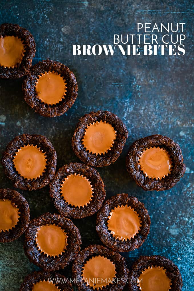 Peanut Butter Cup Brownie Bites resting on a blue speckled surface.