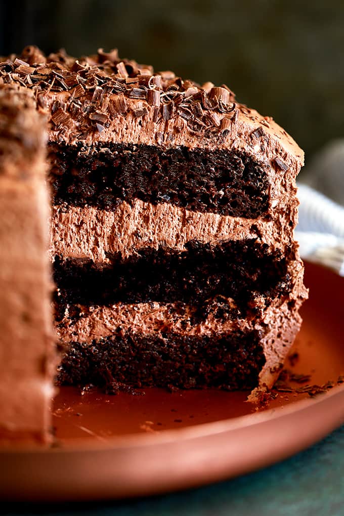 This Triple Layer Chocolate Brownie Cake is for the die-hard chocolate lovers of the world.Â  Chocolate cake, fudgy brownie, another layer of chocolate cake and it's all covered with the most delicious chocolate buttercream.Â  Grab an icy cold glass of milk and prepare to enjoy every last biteÂ of this chocolate nirvana.Â Â 