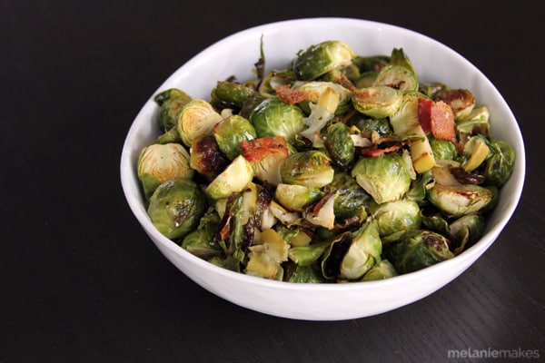 Tender roasted Brussels sprouts, crispy bacon and sweet apple come together to create a simple, yet satisfying, holiday - or anytime! - side dish. Believe me when I say that these Roasted Brussels Sprouts with Bacon and Apple will become a Thanksgiving dinner staple.