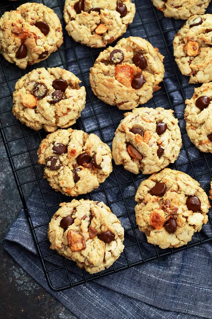 These hearty Butterfinger Oatmeal Chocolate Chip Cookies are a chocolate and candy bar lover's dream. Loaded with oatmeal, chunks of candy bar and studded with chocolate chips, they're a cold glass of milk's perfect companion.