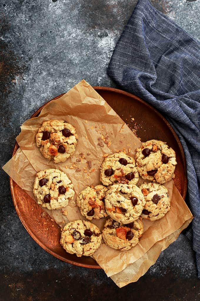 These hearty Butterfinger Oatmeal Chocolate Chip Cookies are a chocolate and candy bar lover's dream. Loaded with oatmeal, chunks of candy bar and studded with chocolate chips, they're a cold glass of milk's perfect companion.