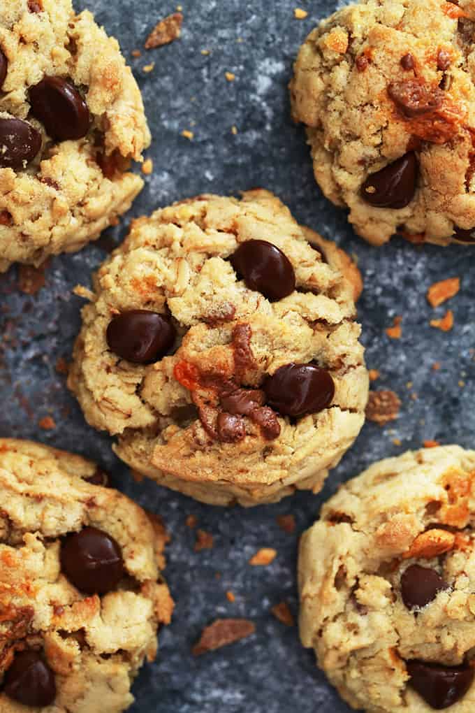 These hearty Butterfinger Oatmeal Chocolate Chip Cookies are a chocolate and candy bar lover's dream. Loaded with oatmeal, chunks of candy bar and studded with chocolate chips, they're a cold glass of milk's perfect companion.