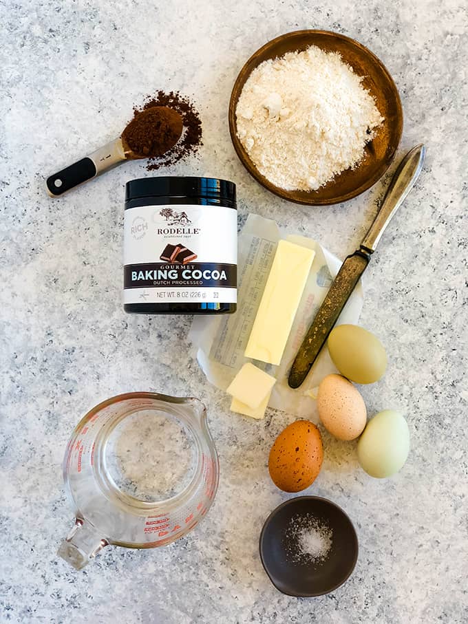 Ingredients for Chocolate Cream Puffs including baking cocoa, flour, butter, eggs, water and salt.