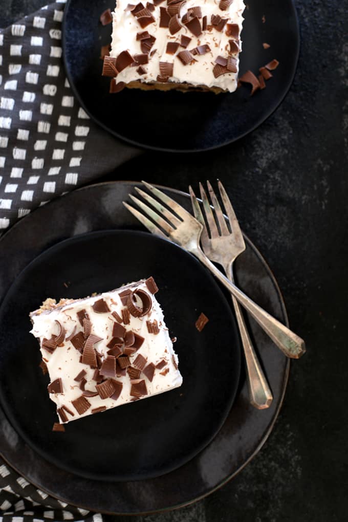 This Peanut Butter Double Chocolate Delight is a new spin on a family favorite that will have you coming back for seconds.  A three-in-one dessert.  Part peanut butter chocolate chip cookie, part cheesecake, part chocolate pie.