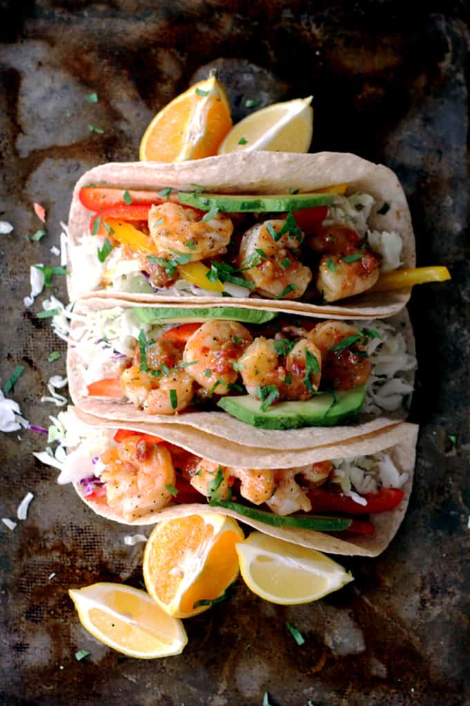 Flour tortillas topped with the crunch of fresh vegetables and delicious sautéed shrimp.  These Rosemary Citrus Shrimp Tacos are not only the most flavorful tacos you've ever made, but the only ones have taken just 15 minutes to prepare.