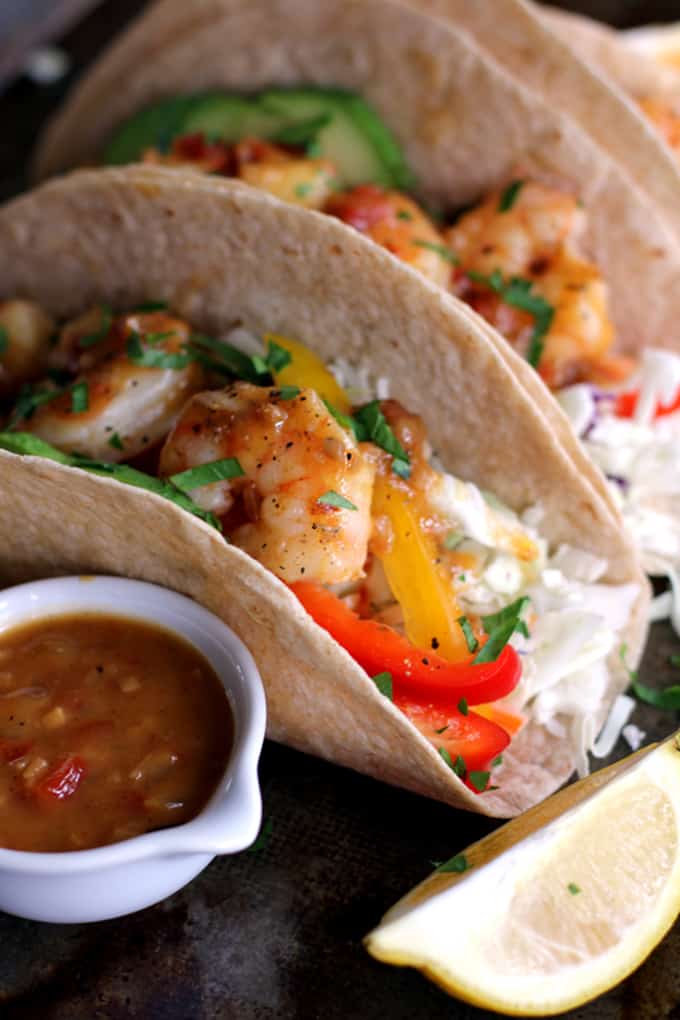 Flour tortillas topped with the crunch of fresh vegetables and delicious sautéed shrimp.  These Rosemary Citrus Shrimp Tacos are not only the most flavorful tacos you've ever made, but the only ones have taken just 15 minutes to prepare.