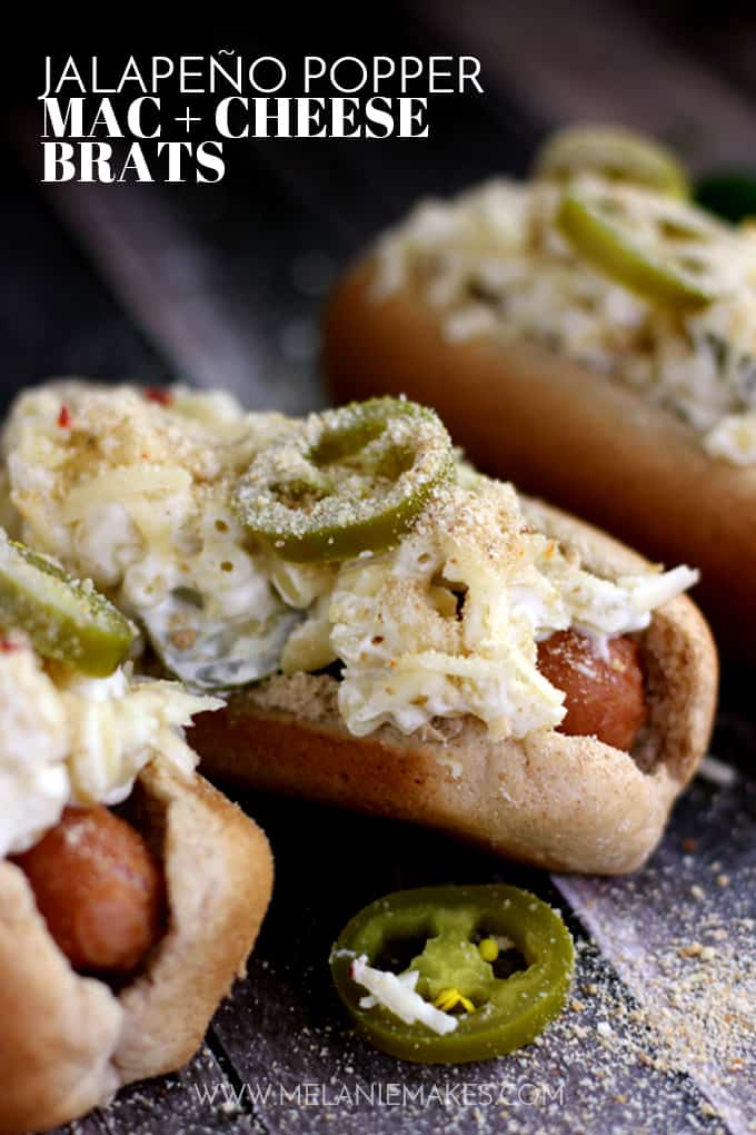These Jalapeño Popper Mac and Cheese Brats are one of your favorite appetizers dressed up as a main dish. A grilled to perfection brat is nestled into a toasted bun and then topped with the cheesiest, meltiest, tastes just like a jalapeño popper mac and cheese. Each bratwurst is then garnished with additional shredded white cheddar jalapeño cheese, pickled jalapeños and toasted breadcrumbs. 