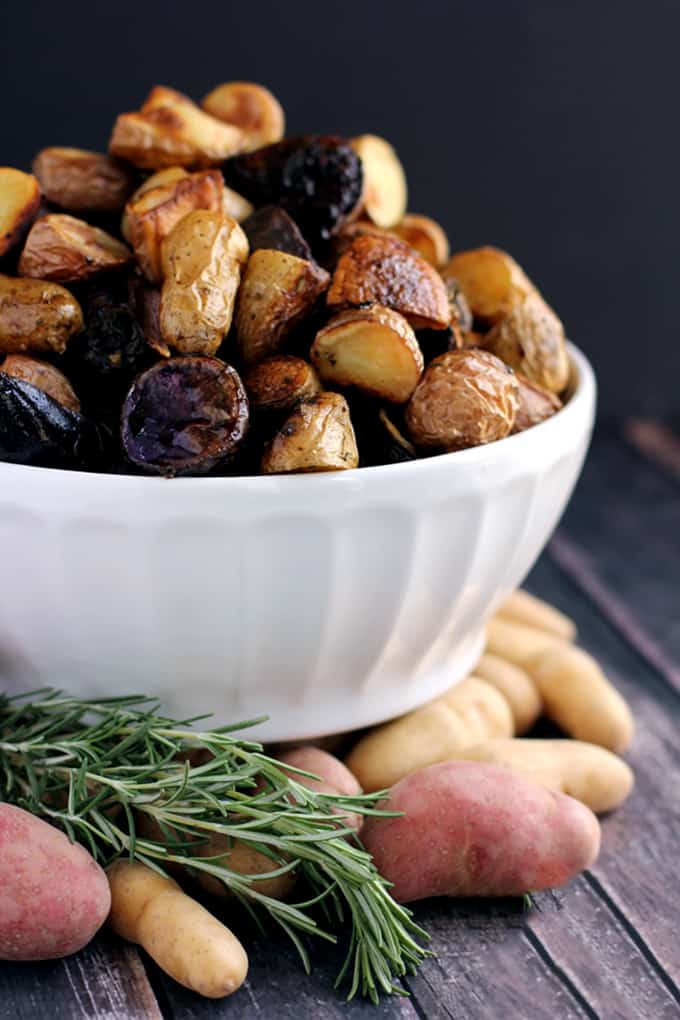 This Roasted Balsamic Rosemary Potato Salad says good riddance to mayonnaise! Instead, these rosemary flecked potatoes are roasted with red onion and garlic and dressed with extra-virgin olive oil and balsamic vinegar. Served warm or at room temperature, this potato salad aims to please.