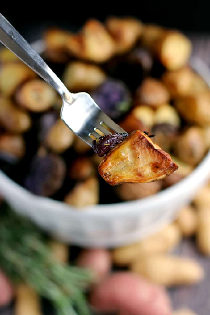 This Roasted Balsamic Rosemary Potato Salad says good riddance to mayonnaise! Instead, these rosemary flecked potatoes are roasted with red onion and garlic and dressed with extra-virgin olive oil and balsamic vinegar. Served warm or at room temperature, this potato salad aims to please.