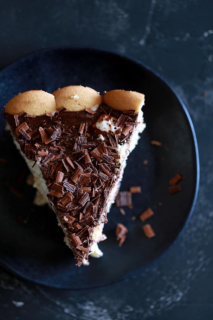 A cold and refreshing Hot Fudge Ice Cream Pie, perfect for the hottest of Summer days.  A quick and easy vanilla wafer crust is covered in layers of vanilla ice cream and homemade hot fudge sauce.  This six ingredient dessert is a family favorite and is sure to become yours, too!