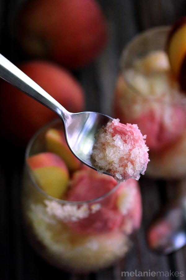 These Peach Granita Sundaes are the perfect end of Summer dessert. Water, sugar, peaches and Riesling wine take a spin in a blender before being poured into a pan and ushered to the freezer. The final touch? Serving this icy, peach goodness over a scoop of ice cream.