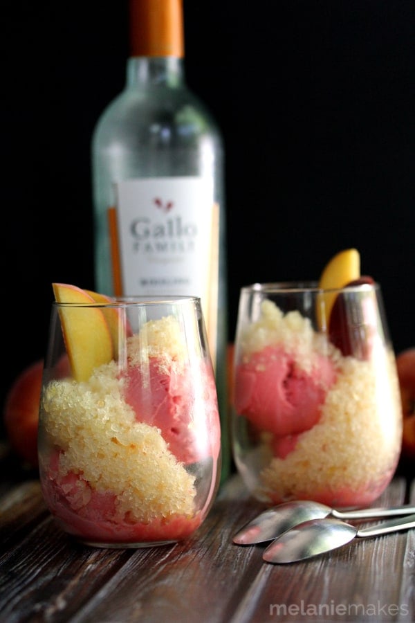 These Peach Granita Sundaes are the perfect end of Summer dessert. Water, sugar, peaches and Riesling wine take a spin in a blender before being poured into a pan and ushered to the freezer. The final touch? Serving this icy, peach goodness over a scoop of ice cream.