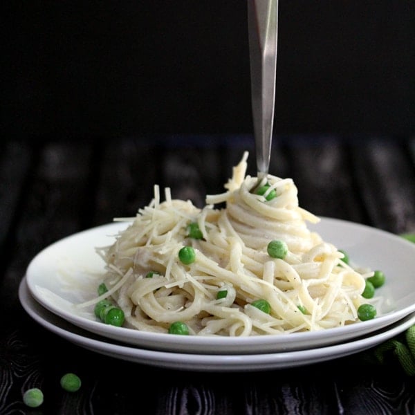 Fettuccine and Peas with Whiskey Pepper Cream Alfredo
