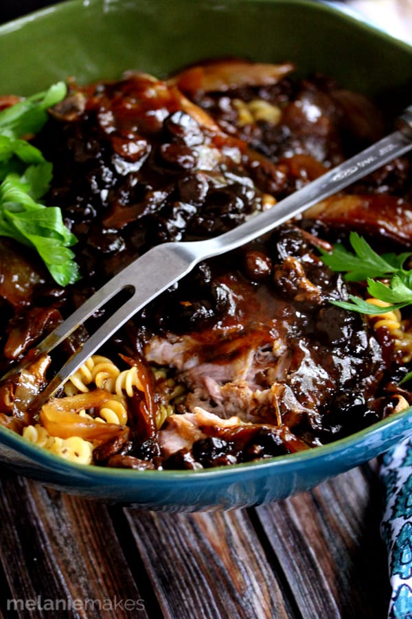 A pork roast seasoned with thyme and bathed in apple juice and nestled into a slow cooker surrounded by sliced onions and dried cherries. A perfect minimal prep, full of flavor dish, this Slow Cooker Pork Roast and Cherries will make your house smell absolutely divine all day as it cooks.
