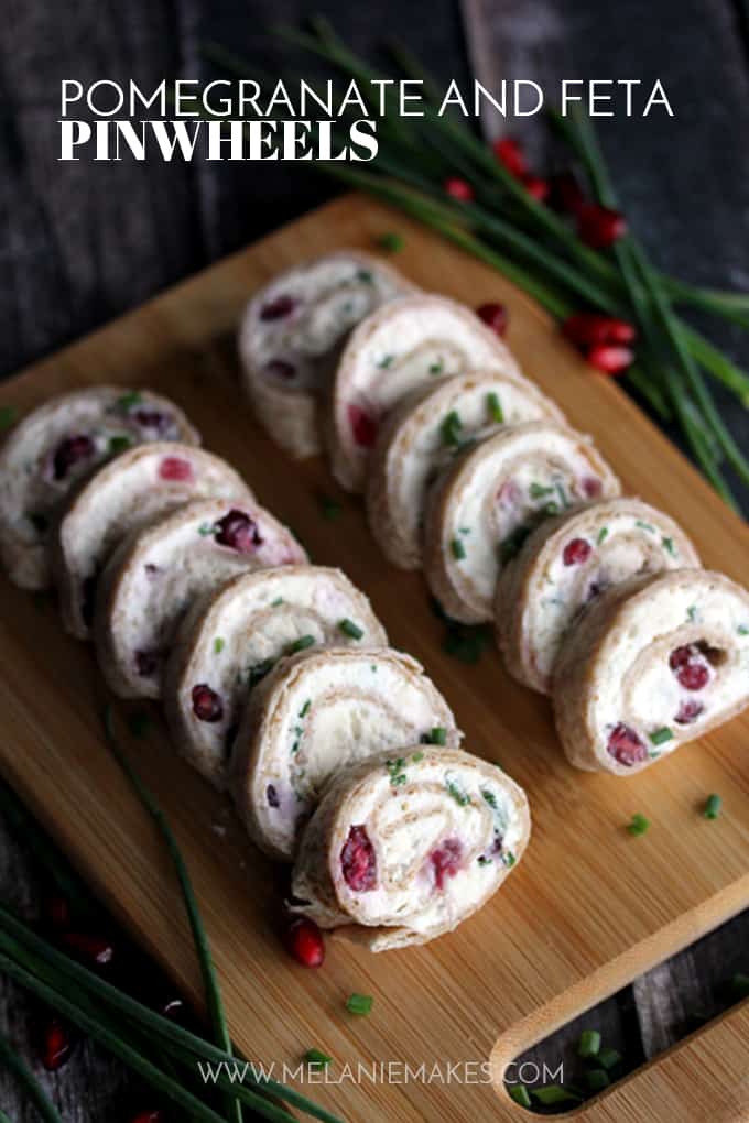 These gorgeous Pomegranate and Feta Pinwheels take just minutes to prepare and are speckled with holiday color thanks to pomegranate arils and chives.  These five ingredient appetizers will have you party ready in no time!