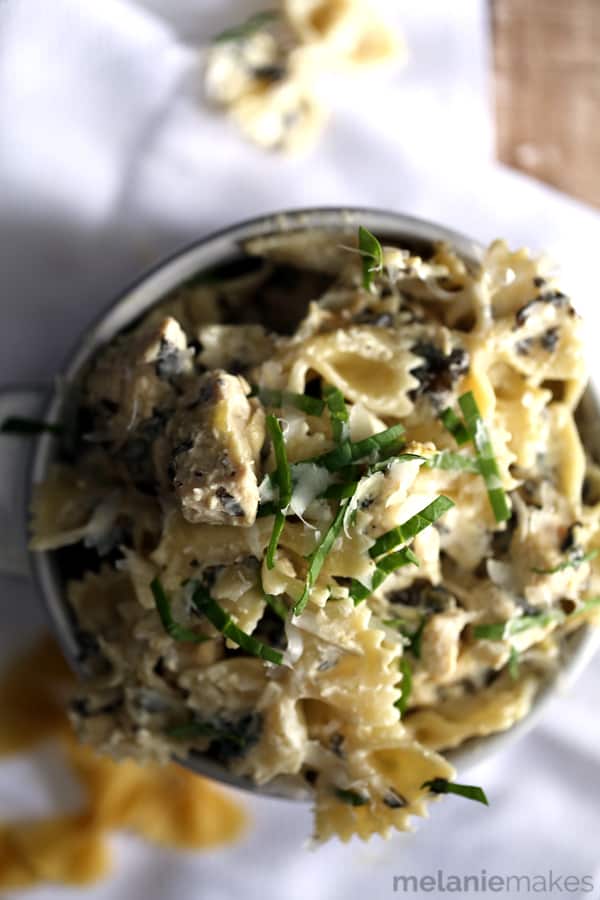 This three ingredient Quick and Easy Chicken Artichoke Spinach Pasta transforms one of your favorite appetizers into a showstopping main course. Artichokes and spinach are blended with the distinct flavor of Romano cheese and then stirred into al dente pasta and chicken to create a delicious and effortless pasta dish.