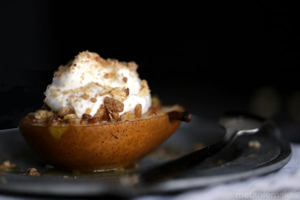 These Granola Streusel Baked Pears couldn't be easier to make and make a great breakfast treat or even a fabulous - almost healthy! - dessert. Gorgeous D'Anjou pears are stuffed with a delicious cinnamon granola streusel and baked in an apple juice bath until fork tender. A dollop of Greek yogurt is placed on top before being sprinkled with yet more struesel. 