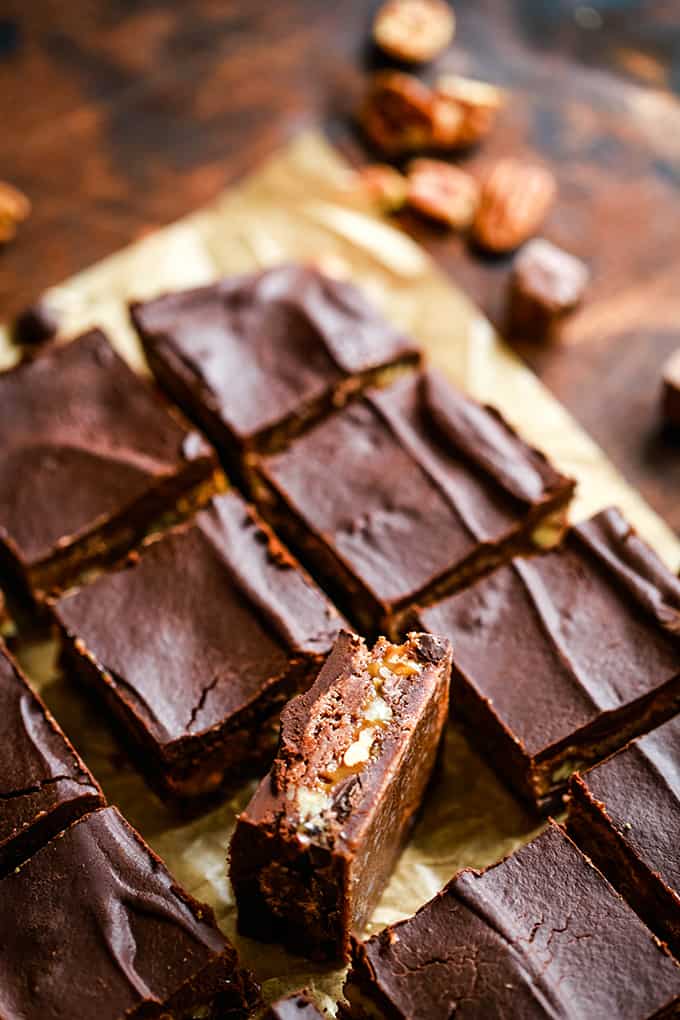 Cut Easy Snickers Brownies with one brownie on its side.