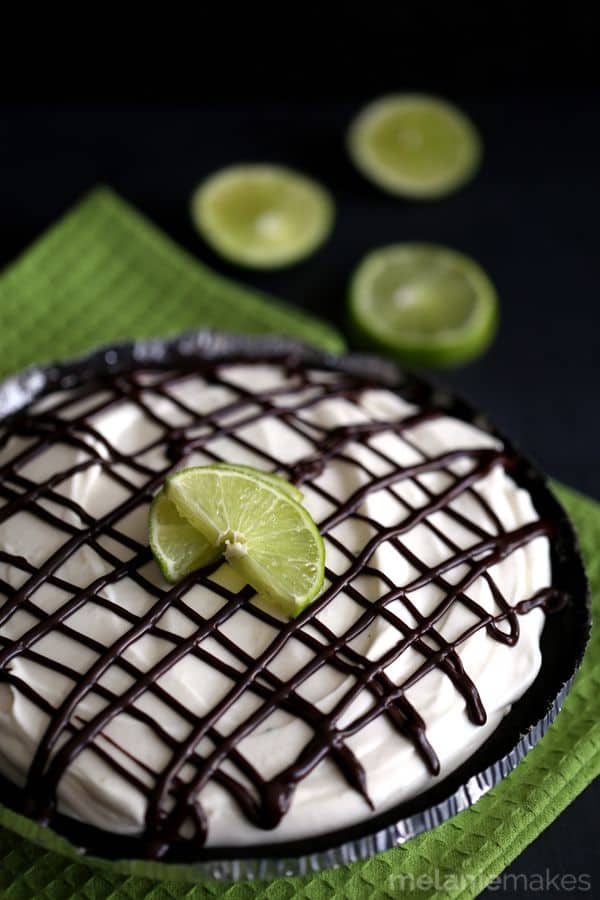 This No Bake Dark Chocolate Truffle Key Lime Cheesecake brings fresh and bright citrus flavors to the table. An Oreo crust and a chocolate ganache drizzle pair perfectly with the luscious lime filling of this no bake cheesecake. This No Bake Dark Chocolate Truffle Key Lime Cheesecake brings fresh and bright citrus flavors to the table. An Oreo crust and a chocolate ganache drizzle pair perfectly with the luscious lime filling of this no bake cheesecake.