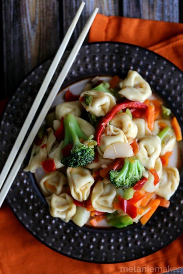 Taking shortcuts in the kitchen doesn't have to mean a boring meal!  This four ingredient Pepper and Garlic Tortellini Stir Fry comes together in just 20 minutes and is guaranteed to make hungry bellies happy. 