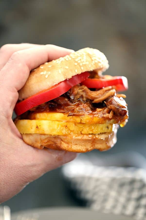 It takes just five minutes and three ingredients to create this sweet and spicy Pineapple and Habanero Slow Cooker Pulled Pork. It's then piled high on a toasted bun and sandwiched between slices of red pepper and fresh pineapple to create the messiest, most delicious pork sandwich that has ever met your lips. 