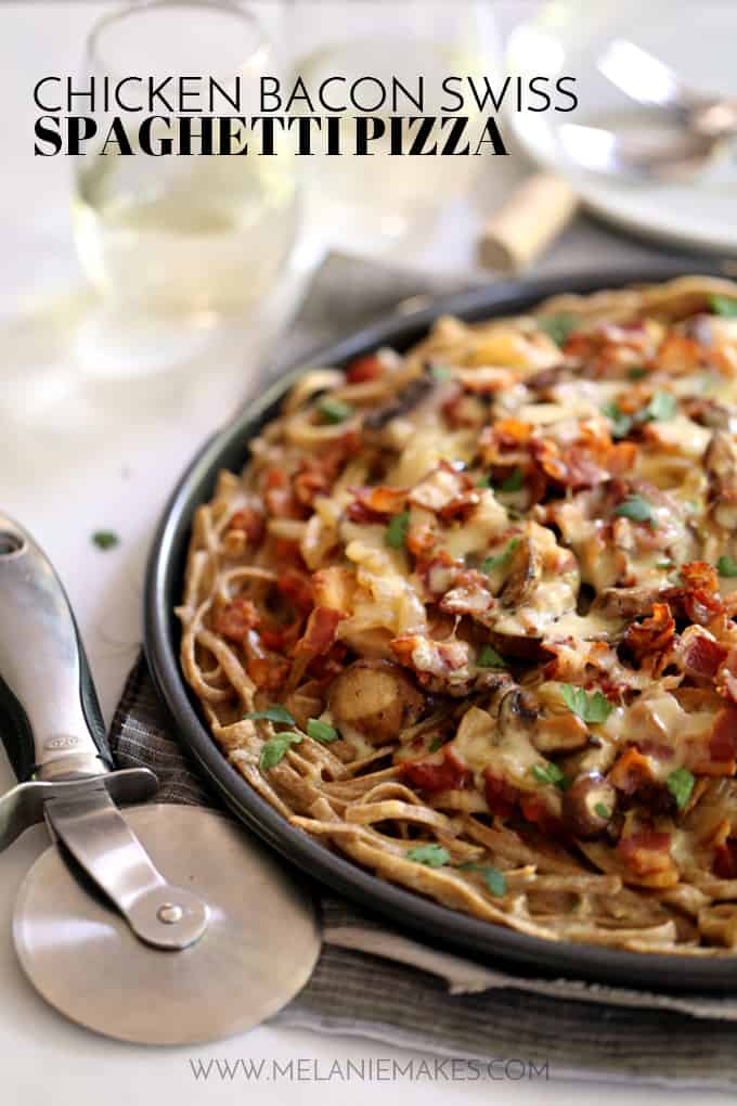 This Chicken Bacon Swiss Spaghetti Pizza is perfect for a night in or a night with friends.  A pasta crust spiked with Swiss cheese is the base of this masterpiece. Topped with bacon, chicken, mushrooms and onions which have all been cooked in rendered bacon fat, the entire pie is sprinkled with a generous amount of even more Swiss cheese.