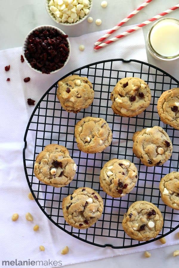 Thick and chewy and exploding with the flavors of fall, these White Chocolate Cranberry Macadamia Nut Cookies are an instant favorite. These cookies are studded with three cups worth of mix-ins meaning it's impossible to take a bite without a chocolate, fruit or a nut piece in it! 
