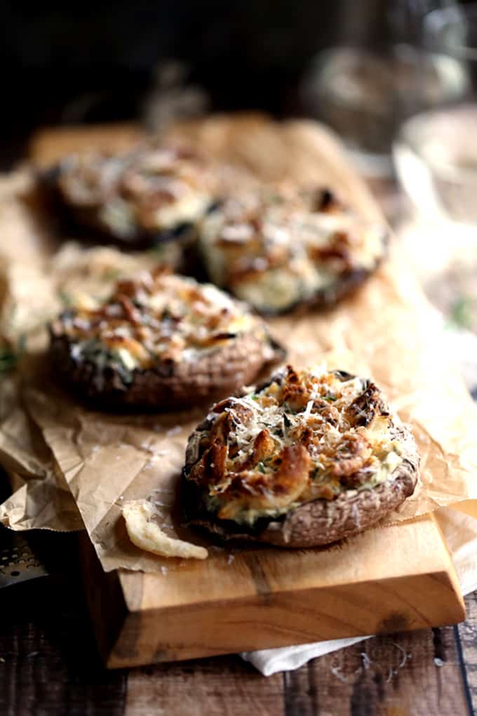 These five ingredient Artichoke and Spinach Stuffed Portobellos take just 10 minutes to prepare.  Meaty portobello mushroom caps are stuffed with artichoke spinach dip before being topped with french fried onions, fresh thyme and Parmesan cheese.