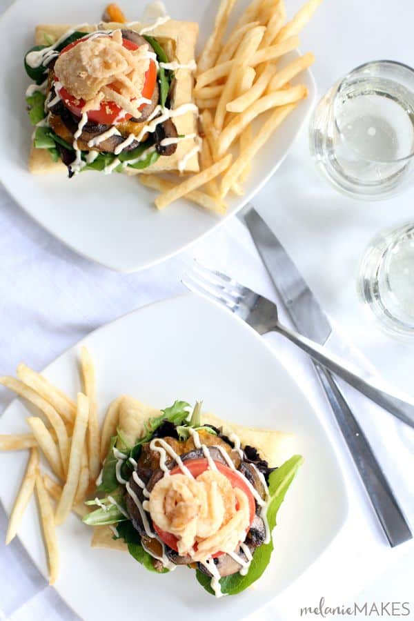 Sure, these Beef Wellington Burgers aren't meant to be handheld but they do welcome a side of fries with open arms! A puff pastry square is layered with salad greens and cheeseburger spiked with horseradish and Dijon mustard before being topped with mushrooms, tomato, french fried onions and a horseradish Dijion mayonnaise.