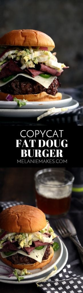 A Copycat Fat Doug Burger that you'd find at Michael Symon's B Spot restaurant. A 3/4 pound beef burger is covered with a slice of Swiss cheese, pastrami and a large heap of jalapeno slaw and it's all sandwiched between a Hawaiian hamburger bun.