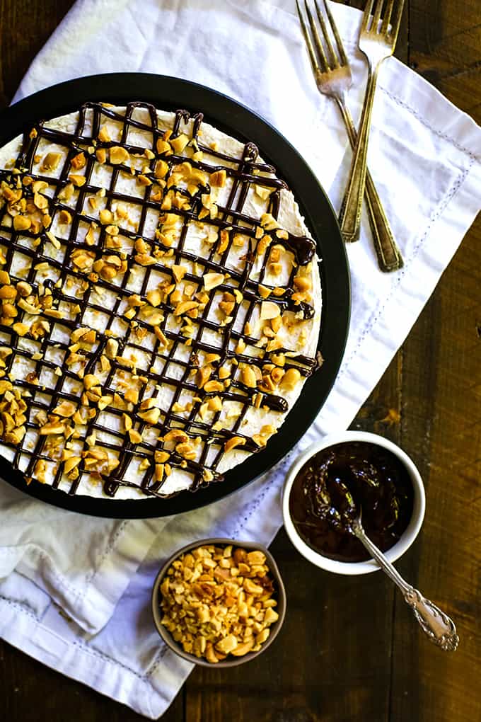 An overhead view of an Almost No Bake Drumstick Cheesecake resting on a white napkin.