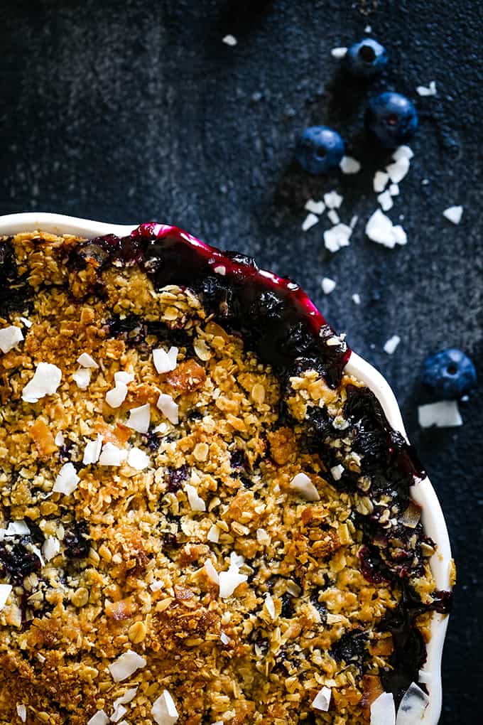 The oat topping of a Coconut Blueberry Crisp.