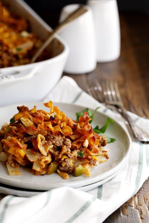 This eight ingredient Hamburger Hotdish is a classic family recipe that will never go out of style. Ground beef, egg noodles and creamed corn combine in this bubbly, cheesy comforting casserole.