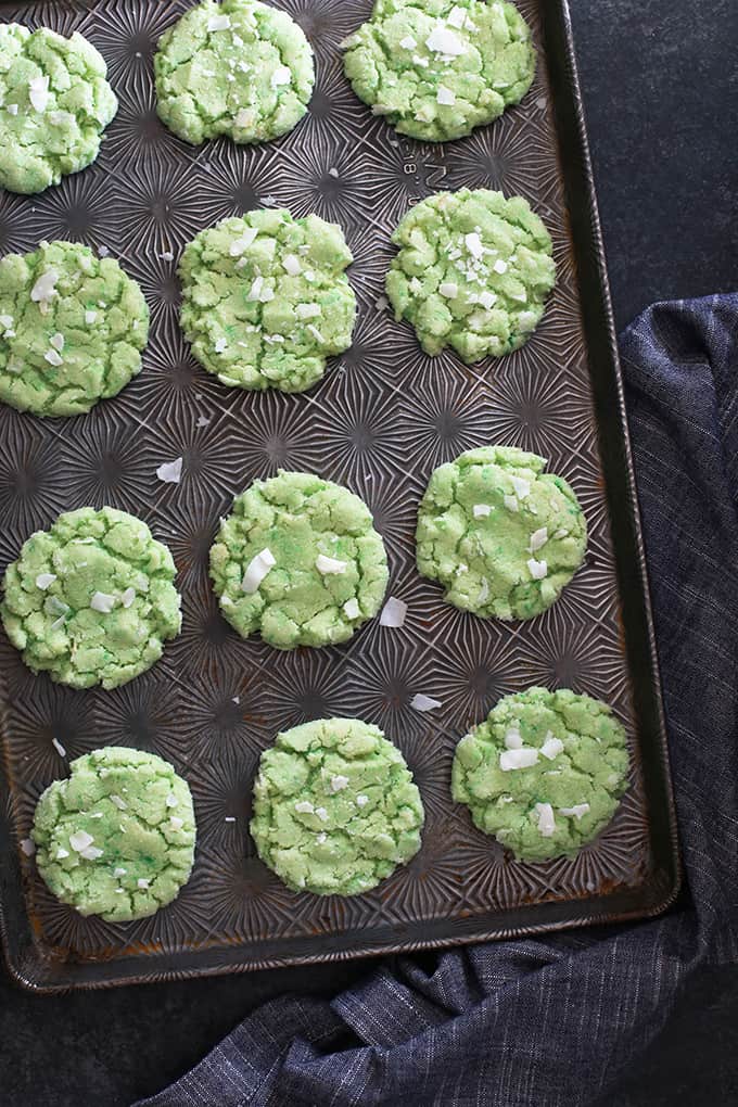 These Coconut Lime Sugar Cookies pack a bright citrus punch thanks to a quick kitchen shortcut. Sparkling with sugar and studded with coconut flakes, these cookies are definitely a welcome sign of spring.