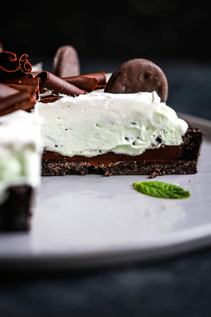 A Grasshopper Ice Cream Tart with slices removed so that you can see each layer.