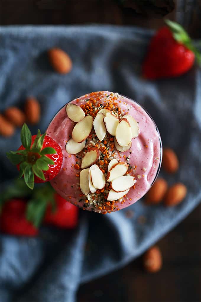 This four ingredient Strawberry Almond Smoothie takes just five minutes or less to prepare. Frozen strawberries, Greek yogurt, almond milk and almond butter whirl together to create this smooth and luxurious treat that's not only perfect for breakfast but also for lunch or a post-workout treat.