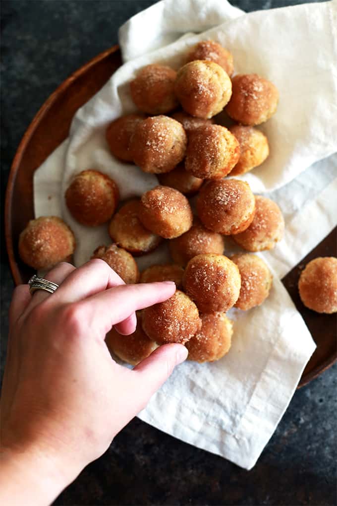 These Mini Applesauce Muffins require no special ingredients and are the perfect morning treat.  A simple muffin batter flavored with applesauce will have you dreaming of crisp fall mornings and a delicious cinnamon sugar topping will have you reaching for "just one more" over and over again.