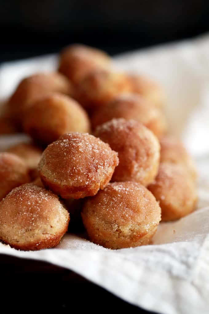 These Mini Applesauce Muffins require no special ingredients and are the perfect morning treat.  A simple muffin batter flavored with applesauce will have you dreaming of crisp fall mornings and a delicious cinnamon sugar topping will have you reaching for "just one more" over and over again.