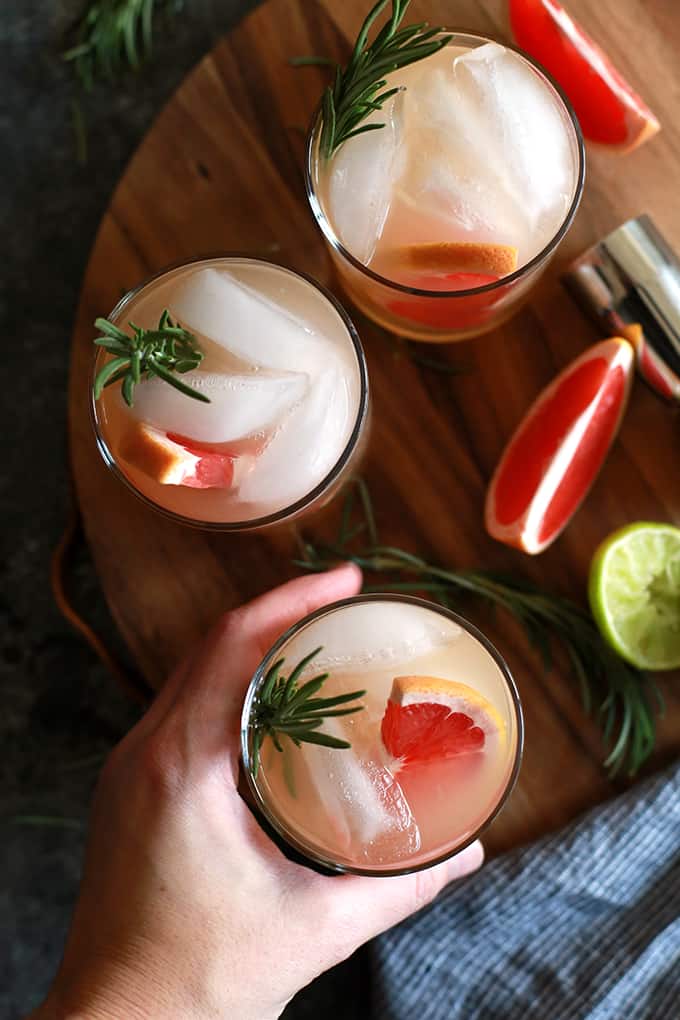 This Rosemary Greyhound Cocktail is destined to become a new favorite.  Grapefruit vodka, grapefruit juice, lime juice and rosemary simple syrup are shaken together, poured over ice and then garnished with fresh rosemary and grapefruit to create this bright and flavorful drink.  