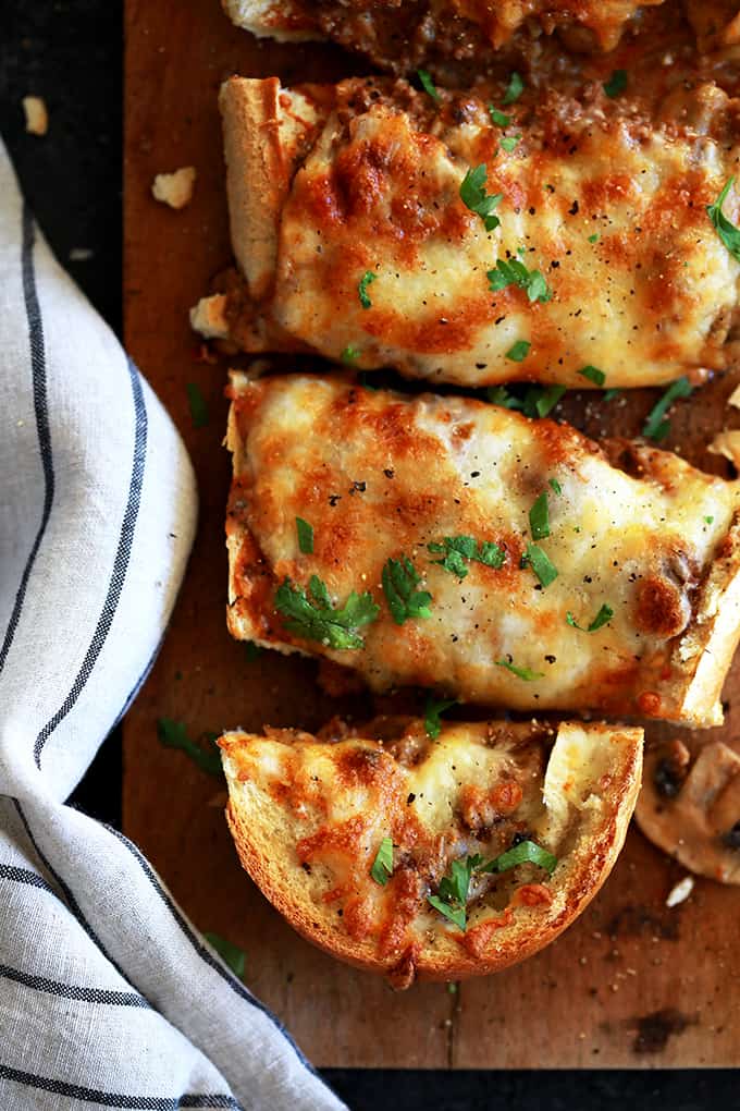 TheseÂ Beef Stroganoff French Bread Toasts are perfect as a hearty appetizer for holiday get togethers or gameday or even as a family pleasing main dish.Â  Crispy, crunchy French bread halves are loaded with a homemade beef stroganoff mixture that's then piled high with a mountain of melty, bubbly cheese.Â  In short, it's the true definition of comfort food that's guaranteed to please anyone that's lucky enough to get a nibble.Â 