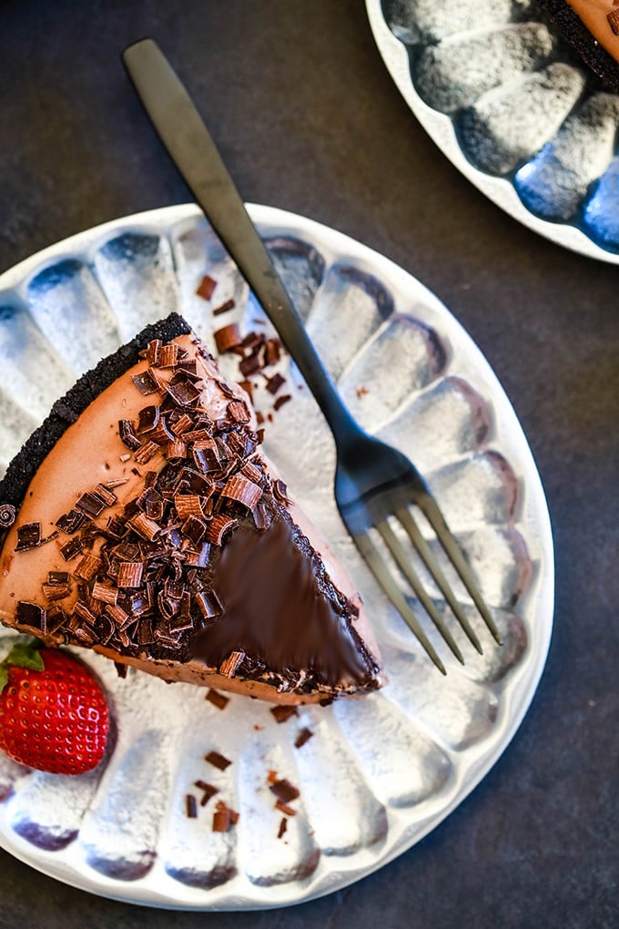 An overhead shot of a slice of No Bake Guinness Chocolate Cheesecake with a fork.