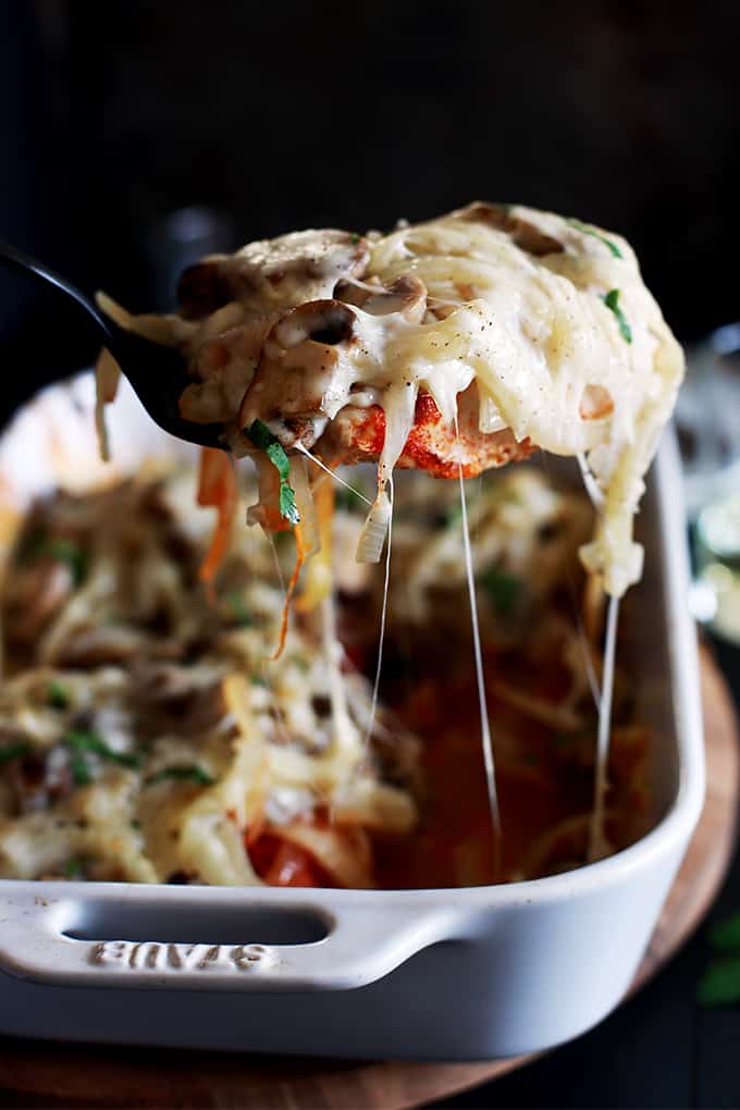 This Baked Chicken and Mushrooms is all about flavor.  Layers and layers of flavor.  Chicken breasts are sprinkled with smoked Spanish paprika before being piled high with sliced onions and mushrooms.  It's all then topped with a melty cap of mozzarella cheese.