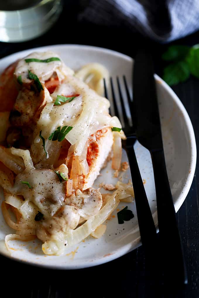 This Baked Chicken and Mushrooms is all about flavor.  Layers and layers of flavor.  Chicken breasts are sprinkled with smoked Spanish paprika before being piled high with sliced onions and mushrooms.  It's all then topped with a melty cap of mozzarella cheese.