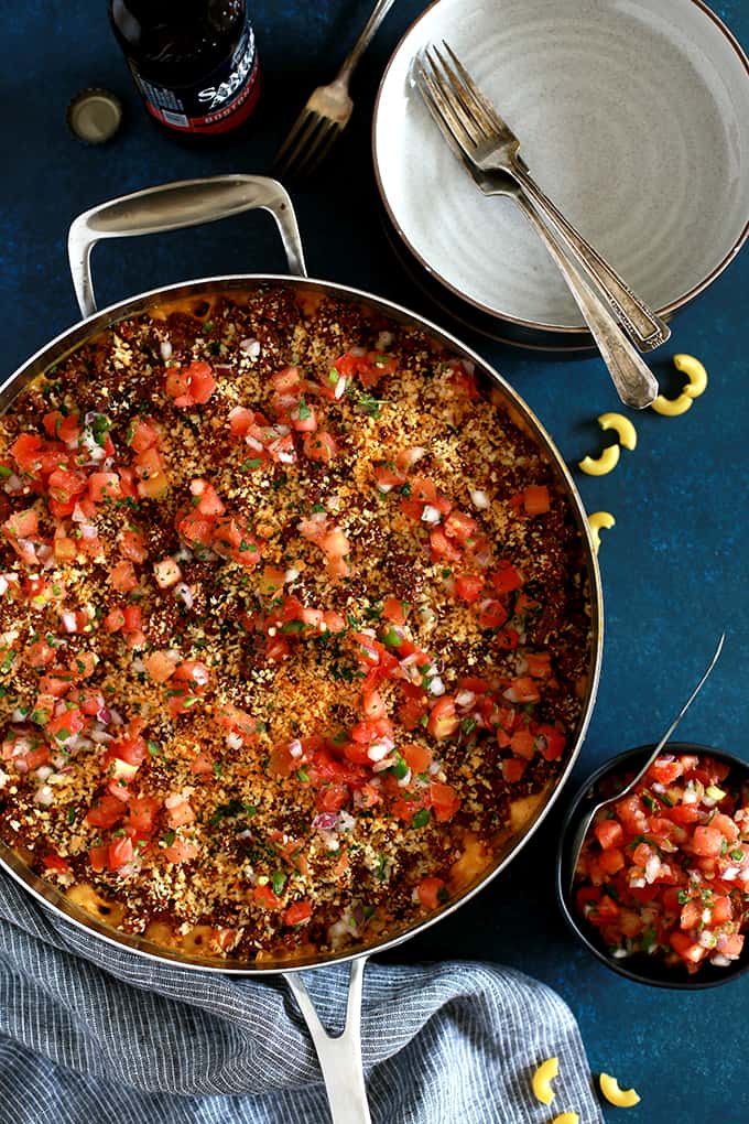 My Green Chile and Chorizo Mac and Cheese is a knock off of ballpark food but with the flavor dial turned up a notch.   Diced green chiles are stirred into a melty and luscious macaroni and cheese that's been spiked with your favorite beer.  Topped with chorizo, panko bread crumbs and pico de gallo, it's sure to have your taste buds on alert.  