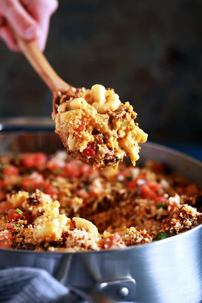 My Green Chile and Chorizo Mac and Cheese is a knock off of ballpark food but with the flavor dial turned up a notch.   Diced green chiles are stirred into a melty and luscious macaroni and cheese that's been spiked with your favorite beer.  Topped with chorizo, panko bread crumbs and pico de gallo, it's sure to have your taste buds on alert.  