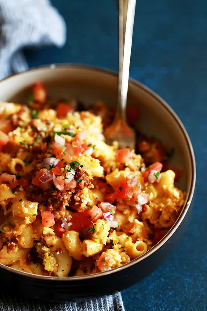 My Green Chile and Chorizo Mac and Cheese is a knock off of ballpark food but with the flavor dial turned up a notch.   Diced green chiles are stirred into a melty and luscious macaroni and cheese that's been spiked with your favorite beer.  Topped with chorizo, panko bread crumbs and pico de gallo, it's sure to have your taste buds on alert.  