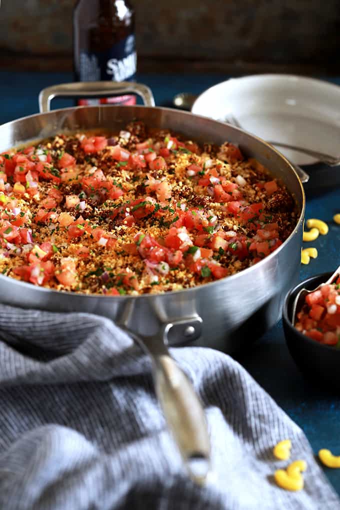 My Green Chile and Chorizo Mac and Cheese is a knock off of ballpark food but with the flavor dial turned up a notch.   Diced green chiles are stirred into a melty and luscious macaroni and cheese that's been spiked with your favorite beer.  Topped with chorizo, panko bread crumbs and pico de gallo, it's sure to have your taste buds on alert.  