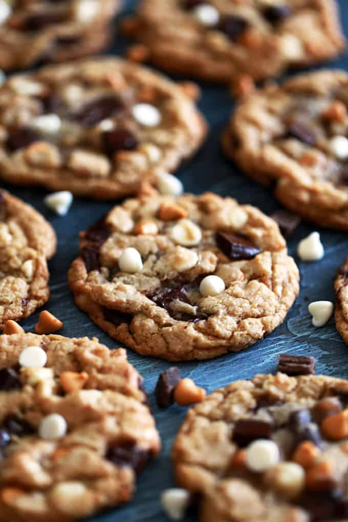These large bakery style Triple Chip Cookies look like something you'd tell a barista to add to your usual morning drink order.  Soft and chewy in the middle and crisp around the edges, these cookies are loaded with dark chocolate chunks, white chocolate chips and butterscotch chips.
