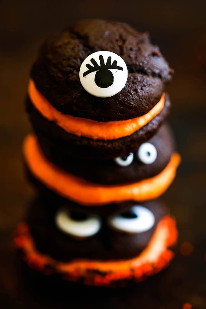 A stack of three Mini Monster Chocolate Whoopie Pies.